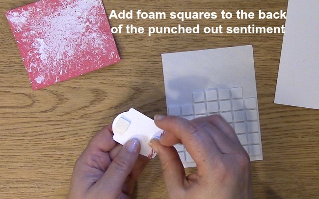 Add foam squares to the back of the punched out sentiment
