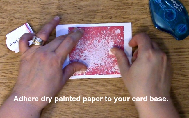 Adhere dry painted paper to your card base.