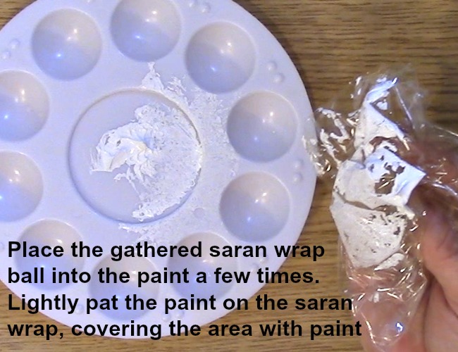 dab saran wrap in paint