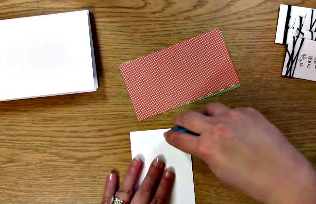 apply adhesive to the back of the patterned paper